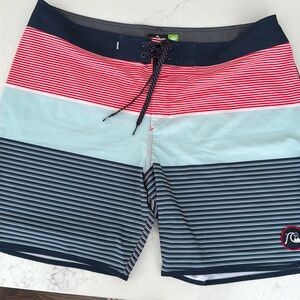 Quiksilver Men’s board shorts, size 38, small mark as  shown in picture